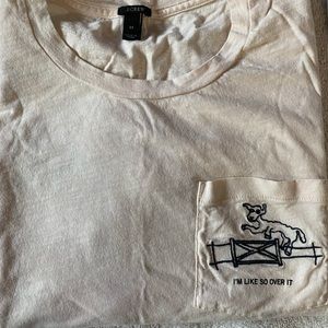 J Crew size M, light peach colored tee with an embroidered goat on the pocket